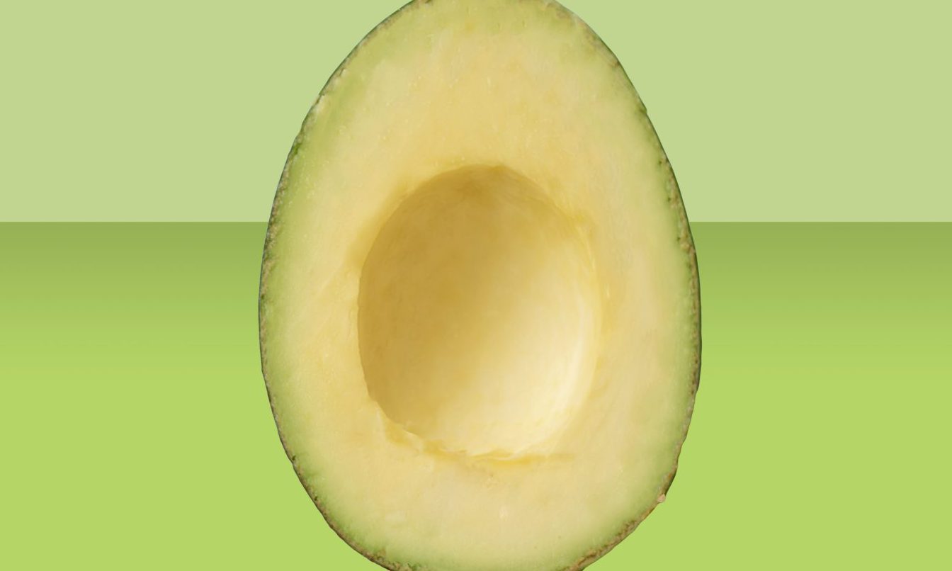 a clean sliced raw avocado ingredient isolalated, minimalism concept